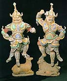 A pair of painted earthenware "Lokopala," Tang dynasty, early 8th century