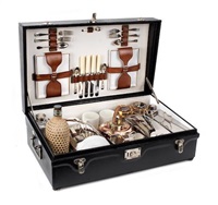 A cased 'Coracle' picnic set for four..., 1909