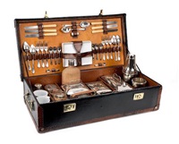 A cased picnic set for six persons by G W..., 1909