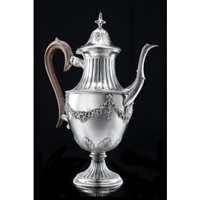 A silver coffee pot