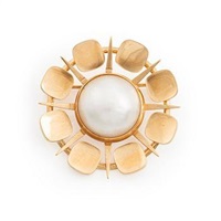 An 18K gold and half pearl brooch, 1965