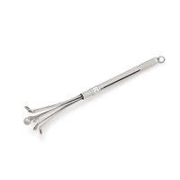 A novelty silver golfing swizzle stick, 1977