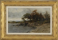 Lakeshore landscape with rocks, trees, and... Lakeshore landscape with rocks, trees, and...