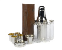 A leather-cased traveller's cocktail set for... A leather-cased traveller's cocktail set for...