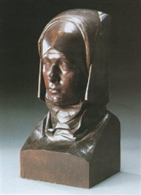 A bust of a woman wearing a wimple headress A bust of a woman wearing a wimple headress