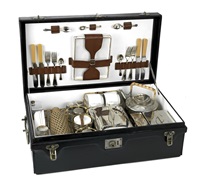 A cased 'Coracle' picnic set for four..., 1909