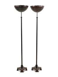 A Pair of Brass and Copper Torchères