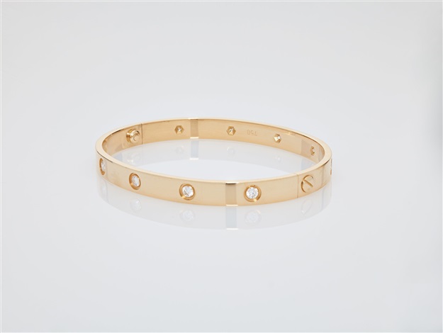 A CARTIER 18 CARAT GOLD LOVE BANGLE 