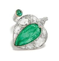 An Emerald, Diamond and Gold Ring