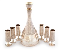A silver decanter and liqueur cup set by..., 1971 A silver decanter and liqueur cup set by..., 1971