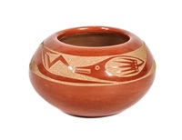 A Redware Bowl With Sgraffito Decoration Having... A Redware Bowl With Sgraffito Decoration Having...