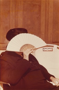 Woman with fan, Italy, 1959
