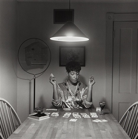 Untitled Woman Playing Solitaire From The Kitchen Table By