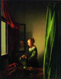 A woman reading a letter at a window A woman reading a letter at a window