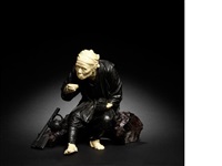 A Tokyo School bronze, wood and ivory woodcutter A Tokyo School bronze, wood and ivory woodcutter