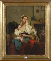 Mère, enfant et un chat dans un intérieur Mère, enfant et un chat dans un intérieur