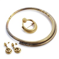 An Old Norse style 14k gold parure,..., 1850–1869