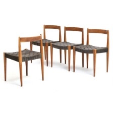 A Set Of Four Oak Side Chairs Upholstered In Seats With Black