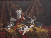 Six kittens at play in a wicker basket