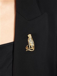 A GEM-SET AND DIAMOND PANTHER BROOCH