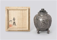 Silver incense burner with flower and bird design Silver incense burner with flower and bird design