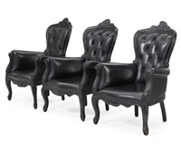 “Smoke” Three burnt wooden armchairs
