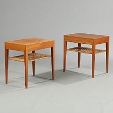A Pair Of Teak Lamp Tables Underlying Shelf With Woven Cane A Pair Of Teak Lamp Tables Underlying Shelf With Woven Cane