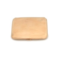 An Edwardian 9 carat gold cigarette case, 1909 An Edwardian 9 carat gold cigarette case, 1909