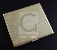 A 1930's engine turned 9ct gold cigarette case, 1939