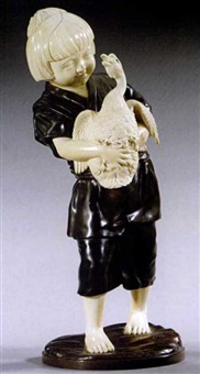 A young boy and goose