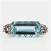 A CF Carlman brooch in 18K white gold set with a 