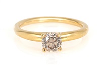 A solitaire diamond ring