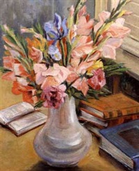 Gladiolas in white vase with books