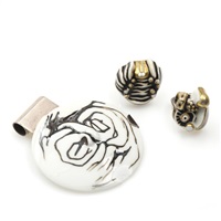 Pendant and two rings 