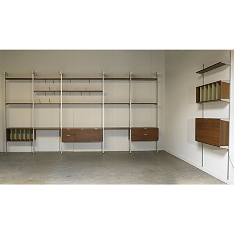 Two Storage Units Composed Of One Floor To Ceiling Five Bay And