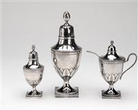 A Dutch silver set of two casters and a..., 1919