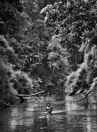 Young Hatiri bathes in a backwater of the..., 2017