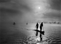 At daybreak, Waurá Indians travel by canoe..., 2005