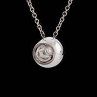 An 18K white gold 'Cave' pendant set with a... An 18K white gold 'Cave' pendant set with a...