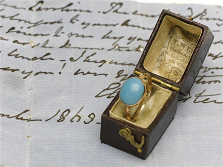 A gold and gem set ring A gold and gem set ring