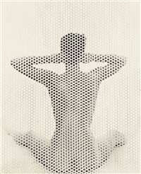 seated nude behind perforated screen, new york by erwin blumenfeld