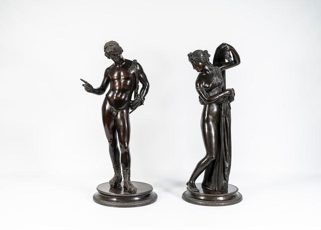 A bronze figure of Narcissus and the Venus Calipigia by Anonymous