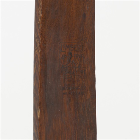 Ebon-Oak inlaid rocking chair by Charles P. Limbert Co on artnet