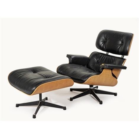 A LOUNGE CHAIR AND OTTOMAN, DESIGNED IN 1956 BY CHARLES AND RAY EAMES, MANUFACTURED by Charles ...