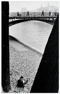 Man Reading between two Trees by André Kertész