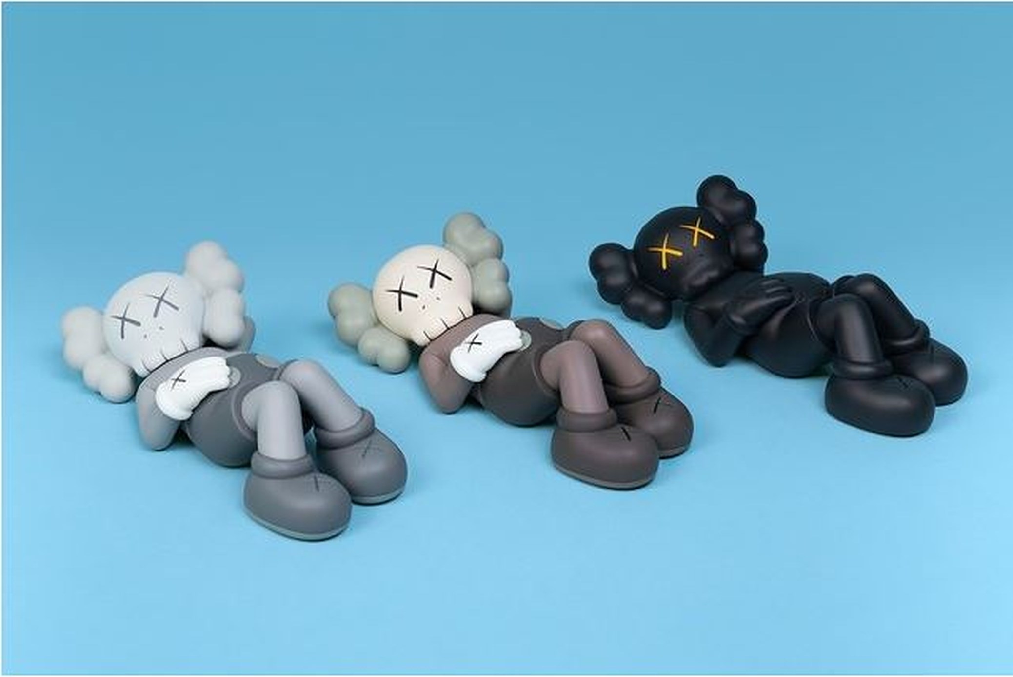 Holiday Japan 9.5 Vinyl Figure Set of Three by KAWS on artnet 
