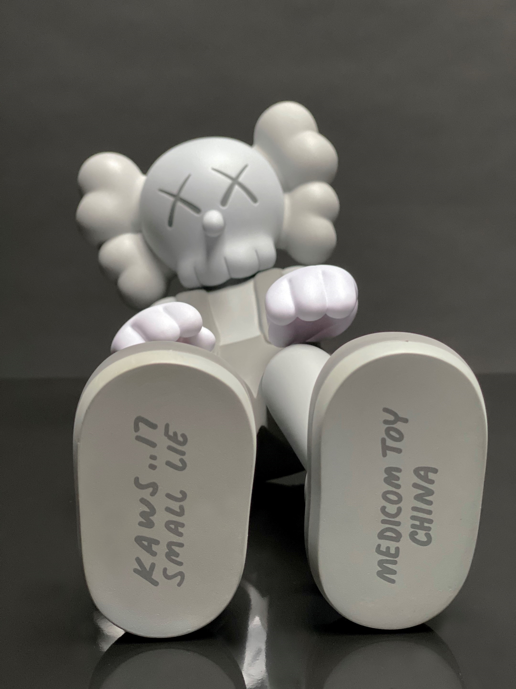 KAWS Small Lie Grey by KAWS on artnet