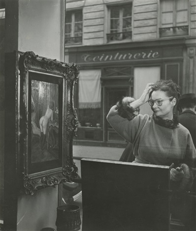 Woman Looking at Painting of a Nude in Paris Antique Shop Window by